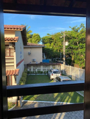 Refúgio a 100m da Praia de Taperapuã, Apartamento Aconchegante de 2 Quartos para Até 4 Pessoas!